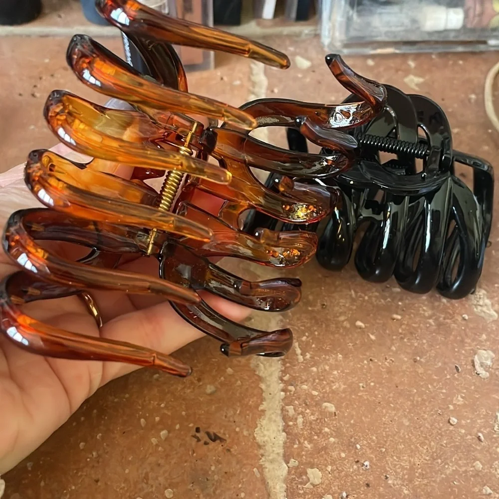 Two large thick hair claws